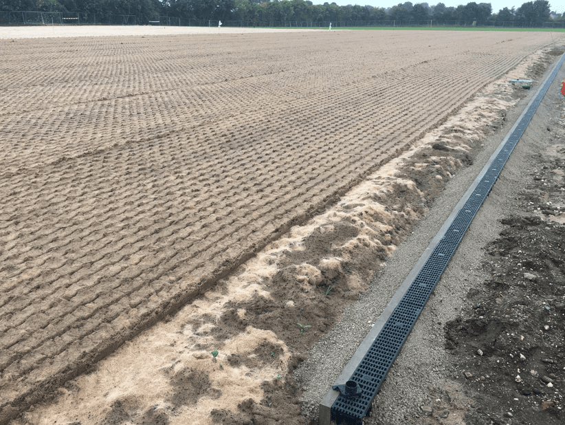 Prepared pitch surface with a channel along its edge